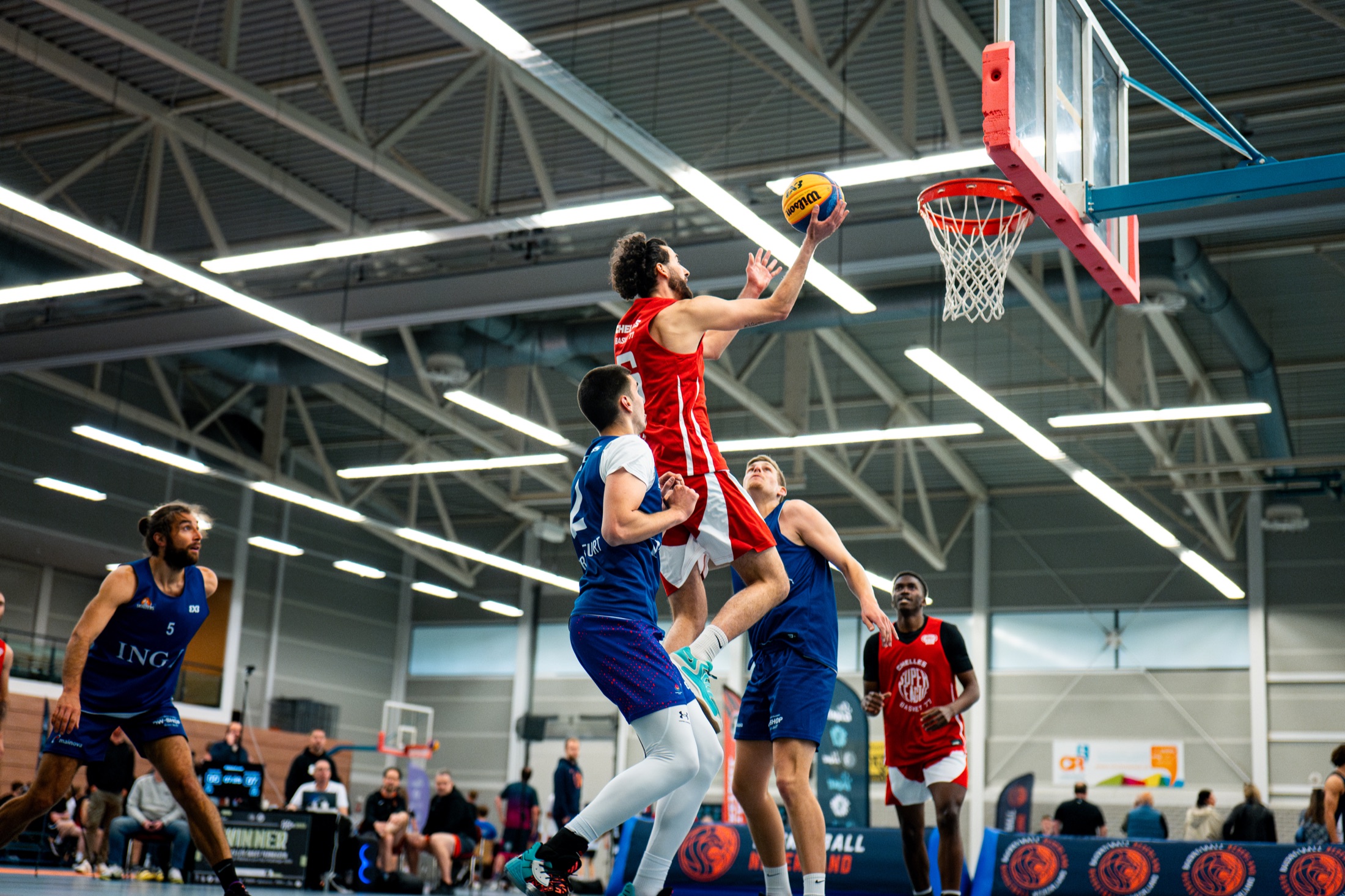 Wedstrijdactie en basketballfotografie voor de Nederlandse Basketball Bond